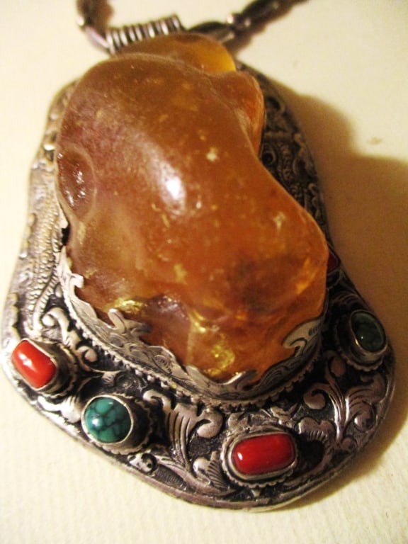 Southwest Large Silver Pendant Set w/Amber: Lot Consists of a Southwest Silver Necklace With a Large Pendant Set With a Large Amber Stone and Others including Coral and Turquoise. It is Suspended From a Silver Bead Chain. The Front and Back of 