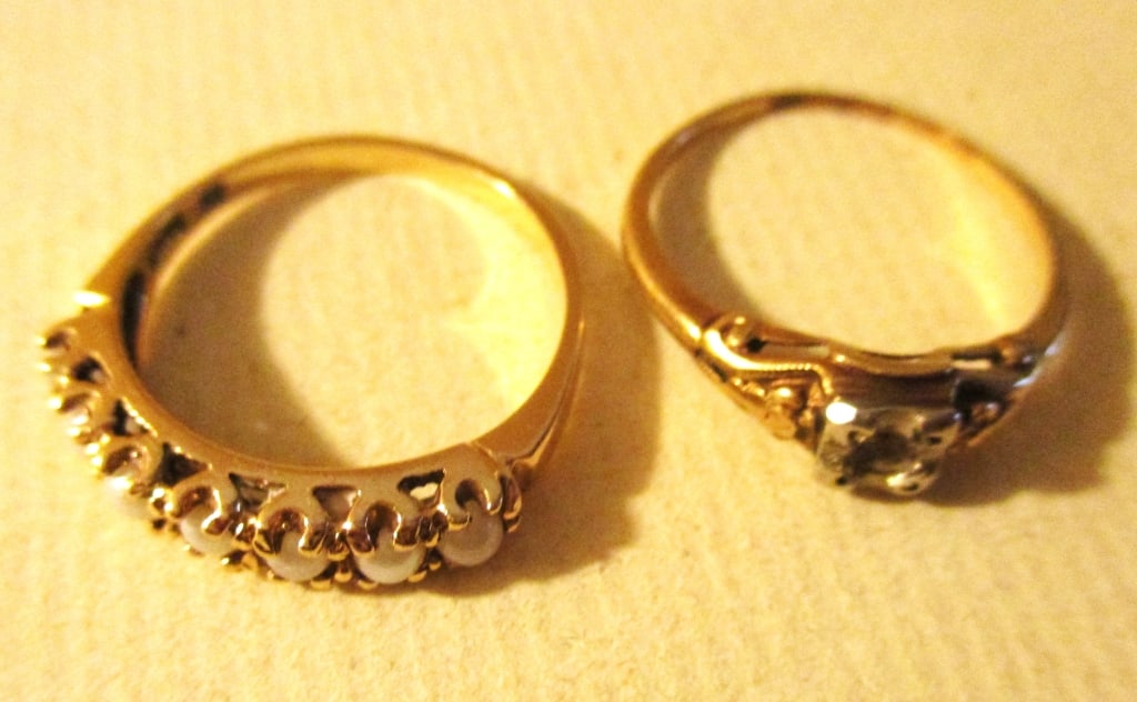 Two 14K Gold Lady's Rings: Lot Consists of Two 14K Gold Lady's Rings. One is SEt With 6 Small Pearls, the Other Has Lost the Stone. Approximate Total Weight is 2.4 dwt. The Ring With Pearls is in Good Shape. The Other is Missin