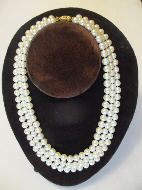Three Strand Pearl Necklace w/a 14K Gold Clasp: Lot Consists of a Pearl Necklace With 3 Strands and a 14K Gold Clasp. The Approximate Length is 30" Inches. In Good Condition With a Classical Look for a Woman Who Has Class. The Pearls are Real