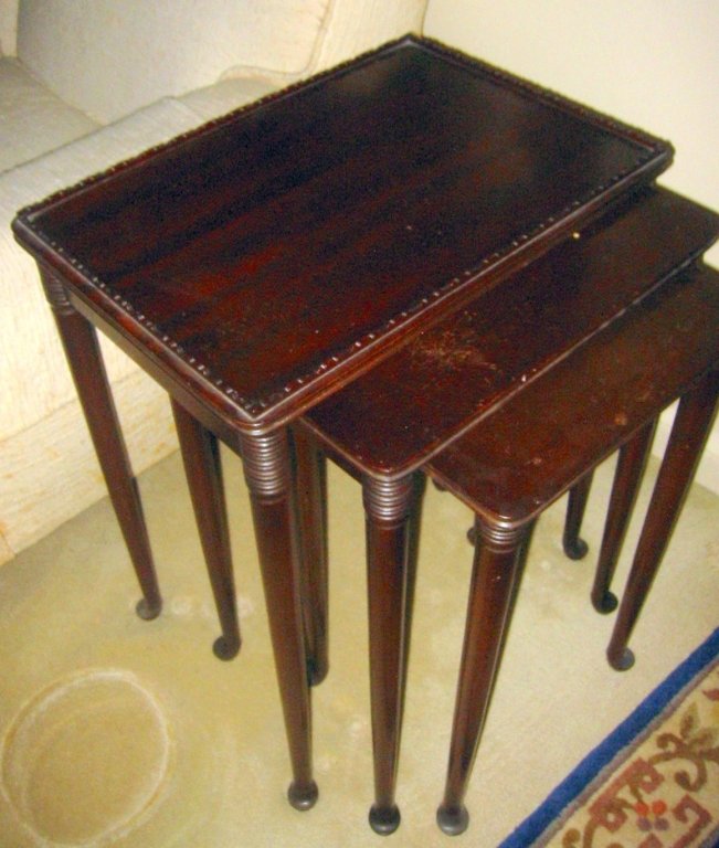 Nest of Three Tables with Queen Anne Feet: Nest of 3 mahogany Queen Anne tables with pad feet in very good condition.