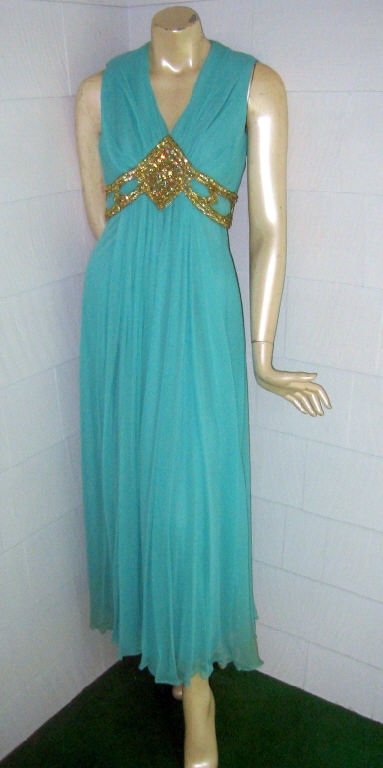 1960's Turquoise Silk Chiffon Gown: 1960's turquoise silk chiffon gown with a beaded bodice in good condition