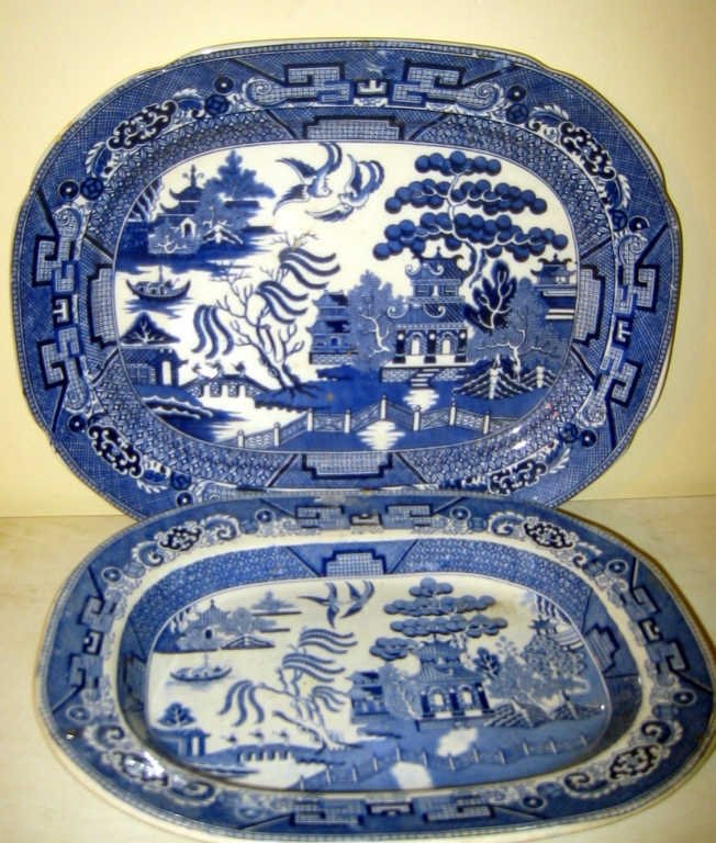 Two Willow Ware Platters: Two Willow Ware platters. One large measuring 12" x 15" and one small, 10" x 13". Smaller one is marked Staffordshire, large one is stamped "Allerton" in good condition.