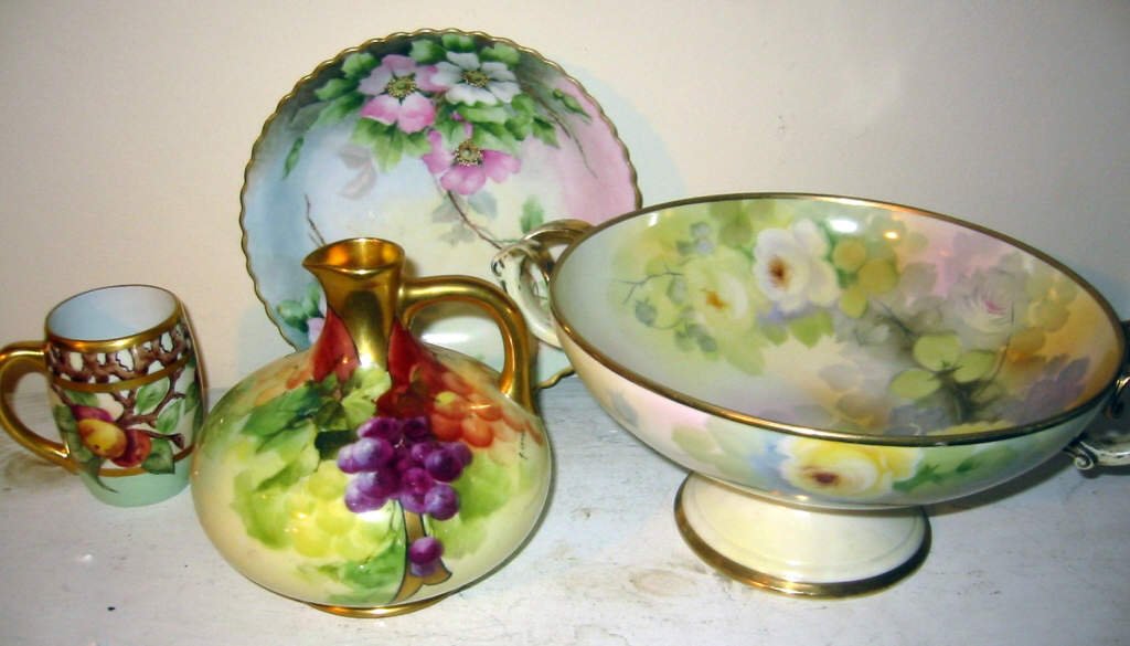 Miscellaneous ot of Hand Painted Porcelain: Some Bavarian, Czech, etc. in good condition. 4 pieces in all. Some wear on gold handles on compote. Compote isn't signed.