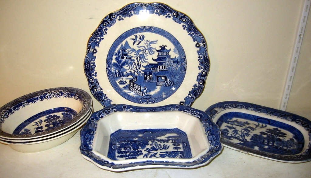 Six Pieces of Willow China: Six pieces of Willow ware China, including cake platter, three bowls, small platter and square vegetable bowl with cover. All in good condition.
