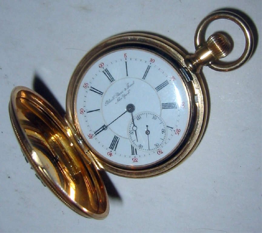 18k Gold & Diamond Black Starr & Frost Ladys Watch: 18k gold Black Starr & Frost lady's watch with a rose diamond monogram. It is not in working condition. The diameter is 1 1/2" The watch itself is in good condition.