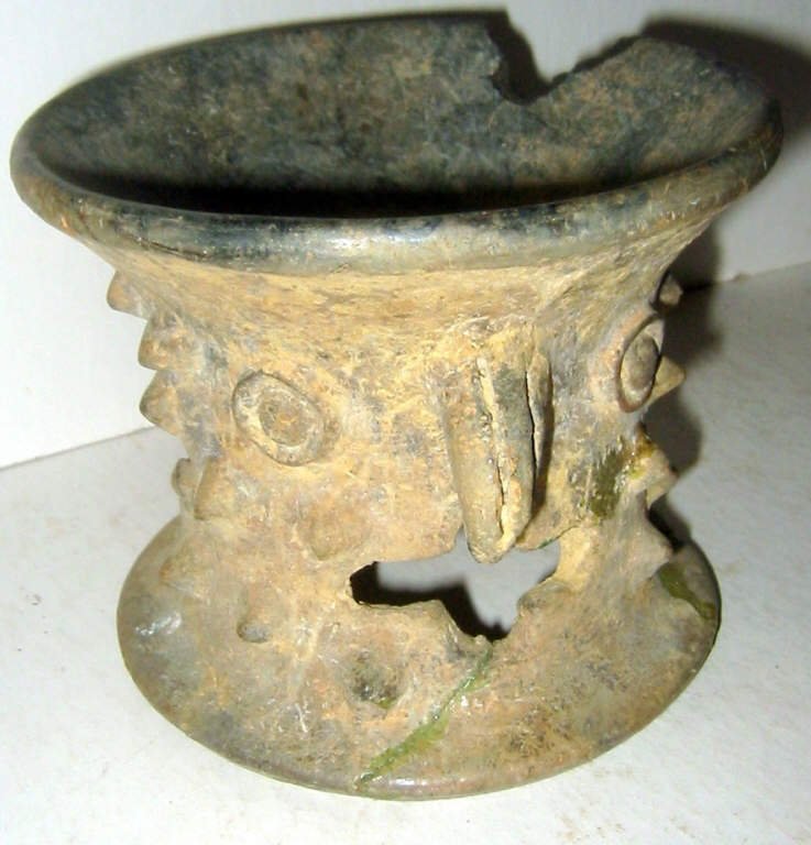 Pre-Columbian Pottery Bowl: Pre-Columbian bowl or stand, most likely to burn incense in a ceremonial act. Condition is fair to poor. There is a piece broken off and missing, other parts have been glued.