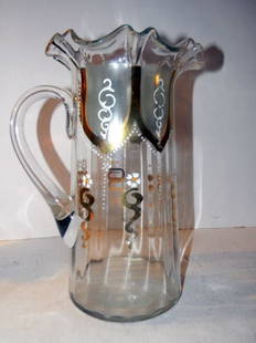 Victorian Glass and Enamel Pitcher: Victorian Glass and Enamel pitcher in good condition, 10" tall.