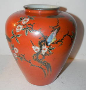 Japanese Porcelain Vase: Japanese porcelain vase with colored enamel and silver decoration. Signed and in very good condition. 7 1/4" tall.