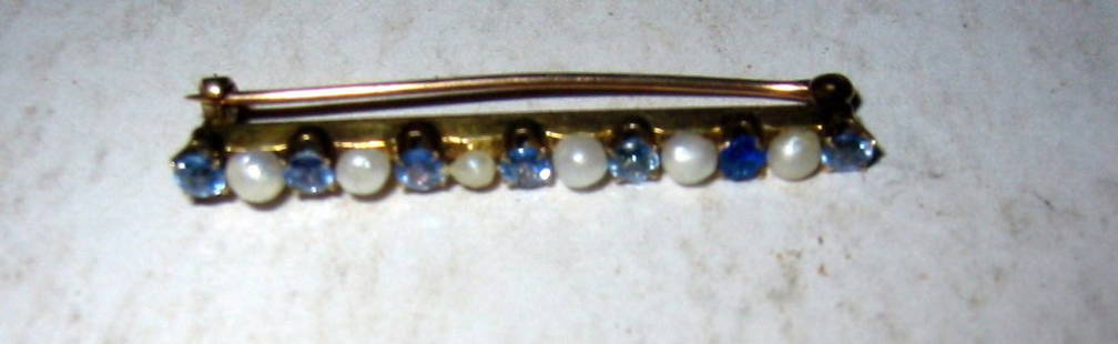 Gold, Sapphire and Pearl Bar Pin: 10k Gold, sapphire and peal bar pin in good condition. It is marked 10k.