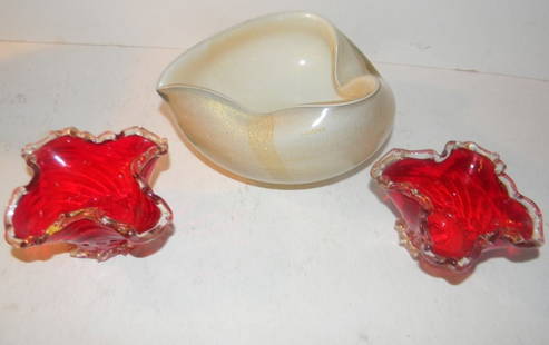 Lot of Murano Glass: Pair of Murano glass salt and Murano candy bowl. Candy bowl has a minor chip. Salts look like Venini but not signed.