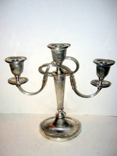 Pair of English Silver Plate Candelabras: Pair of three light English silver plate candelabras with hallmarks in good condition. 12" tall.