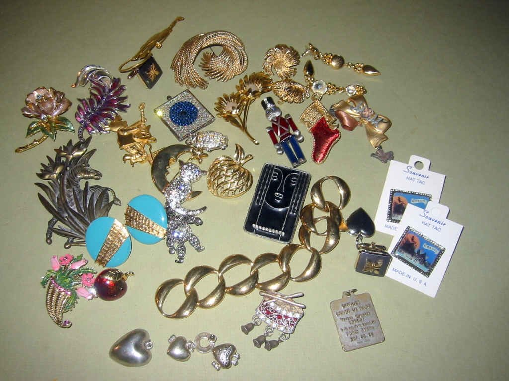 Bag Lot of Costume Jewelry: Bag lot of costume jewelry - many signed pieces - Monet, Ritz, and Trifari, etc. All in good condition.