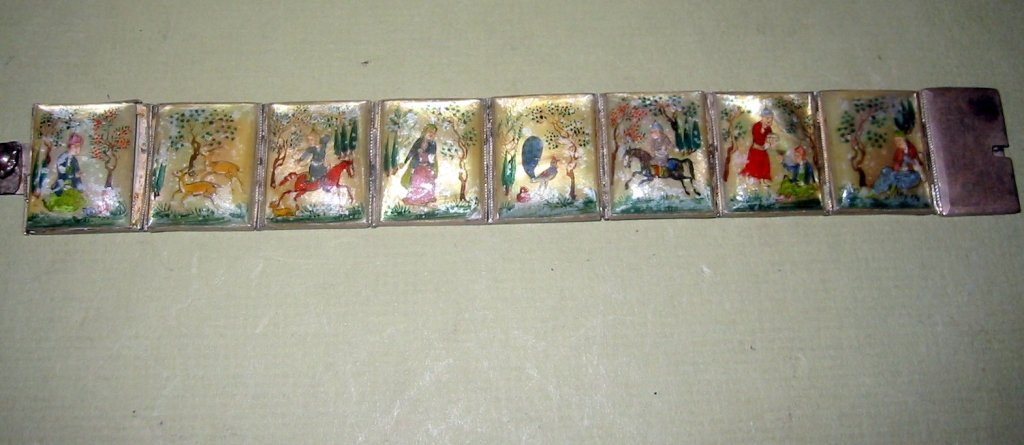 Chinese Silver and Mother of Pearl Bracelet: Chinese or Mongolian silver bracelet set with Mother of Pearl stones. Each stone painted with a scene of Chinese/Mongolian daily life. It is in good condition, silver isn't marked but tested very low 