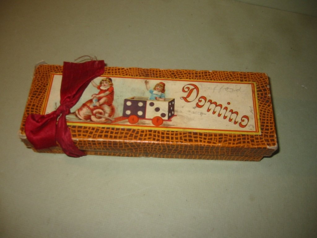19th Century Box of Dominos: 19th century box of child's dominos in the original box in good condition. One corner of the box is separated. The graphics are great.