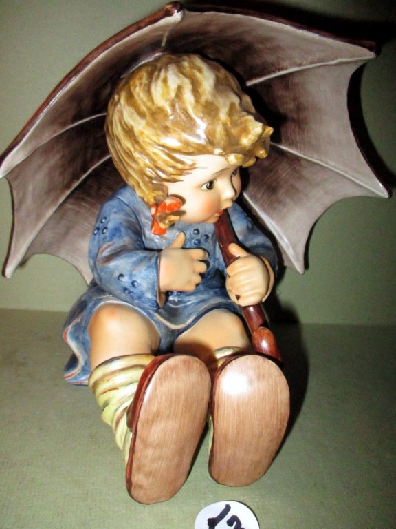 Umbrella Girl: Umbrella Girl #152/11B. Measures 8" tall. TM 6. Used but in excellent condition with very good color.