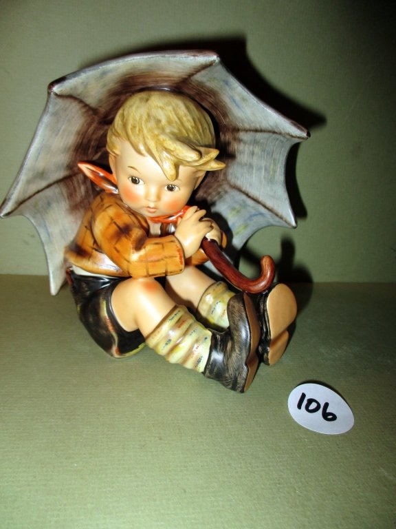Umbrella Boy: Umbrella Boy #152/0/A. Measures 4.75" tall. TM 7. Used but in excellent condition with very good color and in original box.