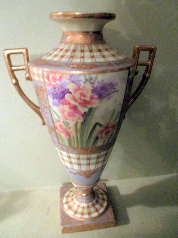 Beautiful Hand Painted Nippon Urn (As Is): Hand painted Nippon urn, by far one of the most beautiful pieces. The underside of the base is fractured but the outside of the base is fine. The underside fracture did not destroy the integrity of th