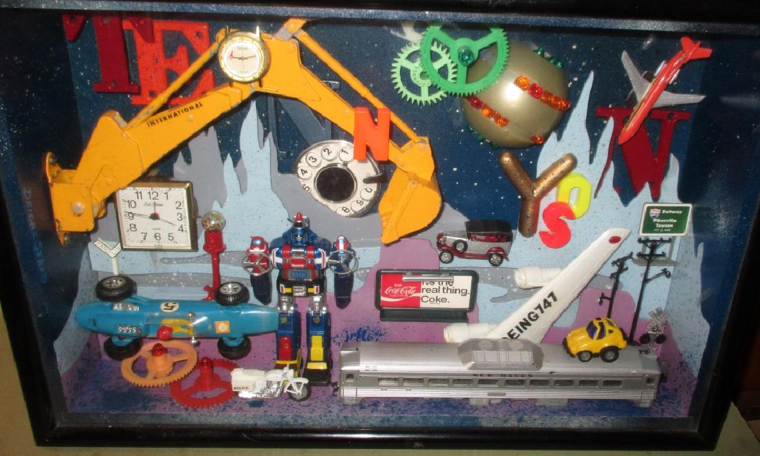 Shadow Box Sculpture of Toys: Shadow box sculpture of toys assemblage, c.a. 1970s in good condition. Not signed but most likely the work of Deardra Delano Stead. An assembly of children's toys. Measures 14" tall x 21" long x 5" de