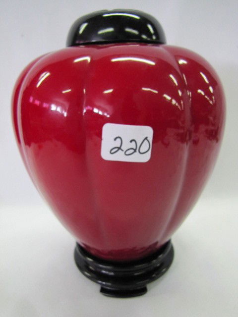 Fenton ebony cased white ginger jar: Fenton ebony cased white ginger jar