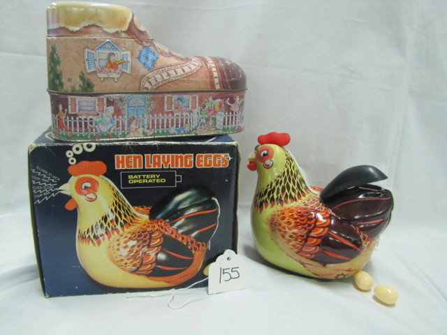 Hen laying egg toy & tin shoe bank: Hen laying egg toy & tin shoe bank