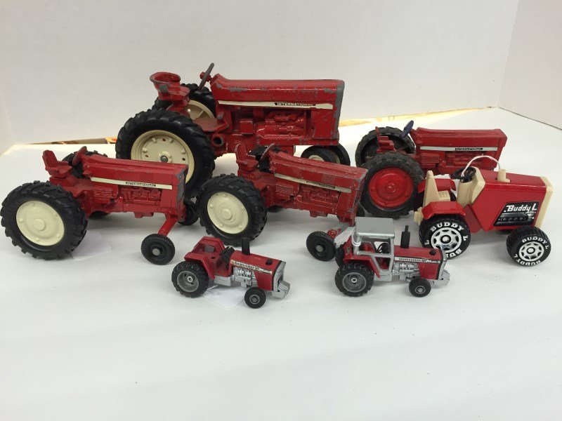 Lot of 7 Red Vintage Toy Tractors: Lot of 7 Red Vintage Toy Tractors