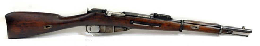 New England Westinghouse Mosin Nagant: This rifle was made in 1915 by Americans and sent to Russia for WW 1. This rifle appears to have been transitioned into a carbine. Not sure who did it but it still is in military configuration.