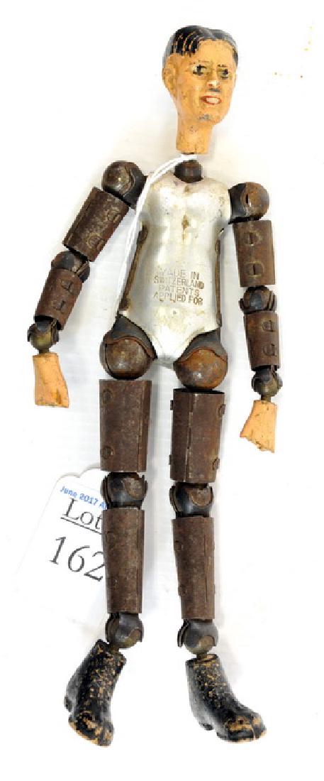 Bucherer metal jointed doll 1920's: made in Switzerland
