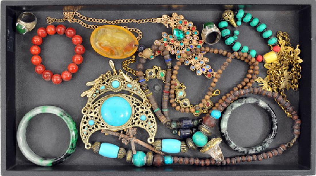 Jade jewelry and Asian necklaces: jade bangle bracelet 3" w x 1" h and carved jade bracelet 2" w x 1" h. Asian beaded peacock pendant necklace, jade rings.