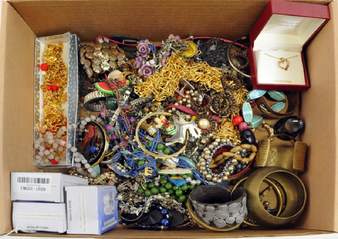 Costume jewelry: Vintage beaded necklaces, colorful post earrings, bangle bracelets, jeweled brooches.