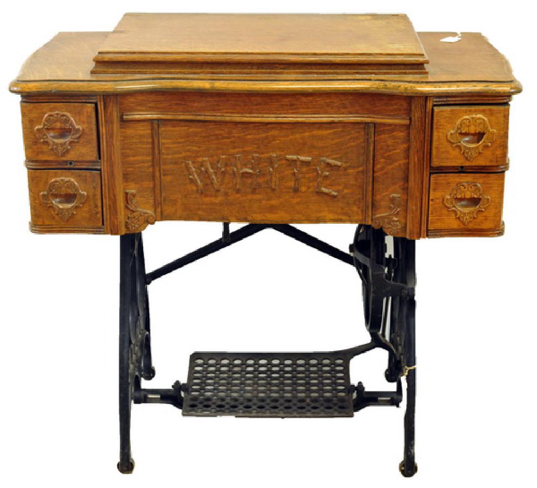 Antique White Family Rotary: Treadle sewing marching in oak case on casters, Cleveland OH. Has original instructions and hardware in the drawers, needs a belt. 34 x 18 x 31.