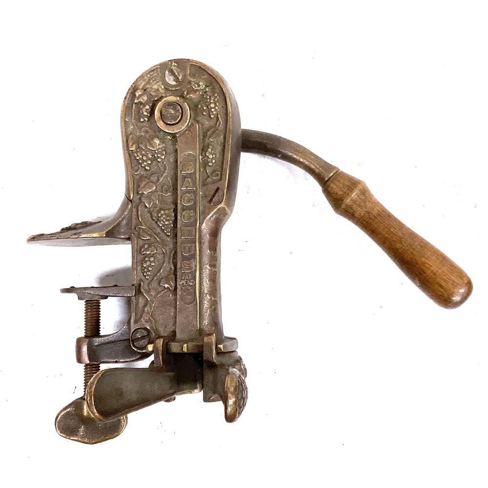 Vintage Cast Iron and Brass Bottle Opener with woo (1 of 1)
