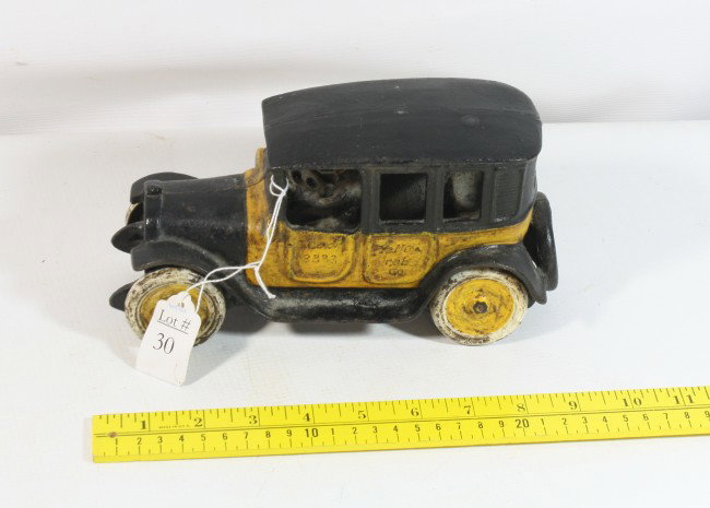 9" Arcade Yellow Taxi cast iron toy: 9" Arcade Yellow Taxi cast iron toy w/ driver