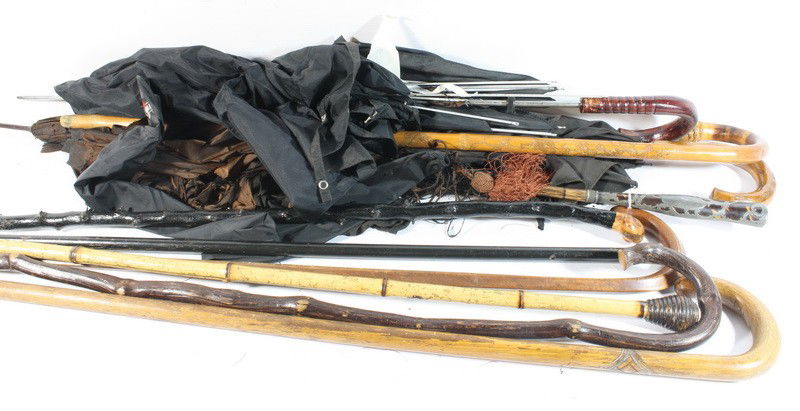 Umbrellas including silver overlay and 7 canes and: Umbrellas including silver overlay and 7 canes and walking sticks