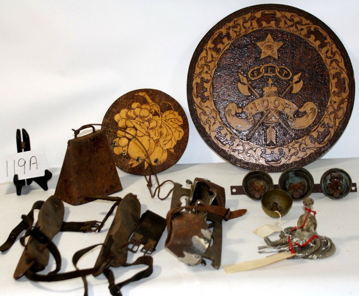 Estate lot with wooden skates, sleigh bells and w: Estate lot with wooden skates, sleigh bells and with Masonic carved wooden plane