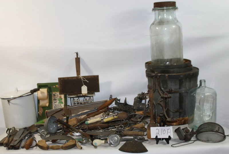 2 boxes Kitchen lot with misc utensils, some with: 2 boxes Kitchen lot with misc utensils, some with wooden handles, one old paint wooden bucket, a white porcelain boiling pot, one glass bottle and one glass jarÂ with Aunt Jemima "Dixie" Kitchen Rem