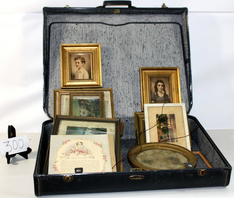 Suitcase full of frames and photos: Suitcase full of frames and photos