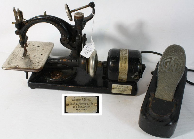 Black Wilcox & Gibbs Sewing machine made by Westing: Black Wilcox & Gibbs Sewing machine made by Westinghouse with black foot pedal