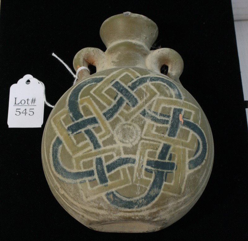 Gray piece of pottery with blue interwoven design : Gray piece of pottery with blue interwoven design on front and back