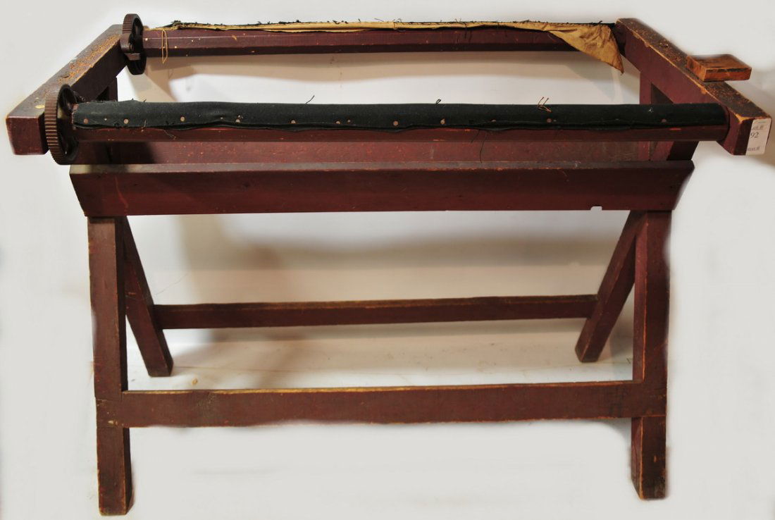 Wooden piece with gears old paint, sawbuck legs, us: Wooden piece with gears old paint, sawbuck legs, used to hold and work on hooked rugs, has good country look