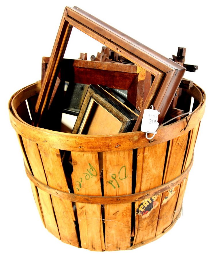 Basket of antique frames: Basket of antique frames
