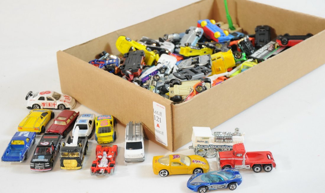Box of assorted Matchbox and Hot Wheels toy cars: Box of assorted Matchbox and Hot Wheels toy cars and trucks