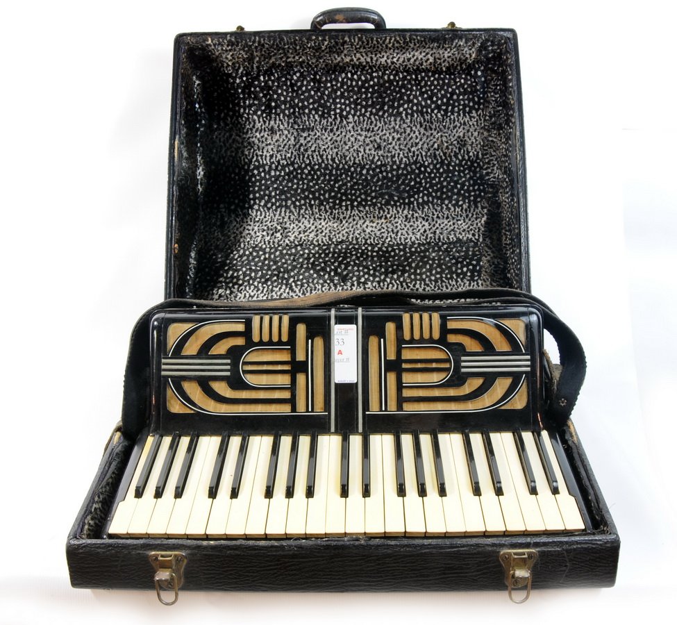 Lombardi Accordion in playing condition. with hard: Lombardi Accordion in playing condition. with hard shell case