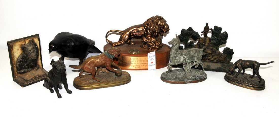 Group of iron doorstops, bookends and figures: Group of iron doorstops, bookends and figures