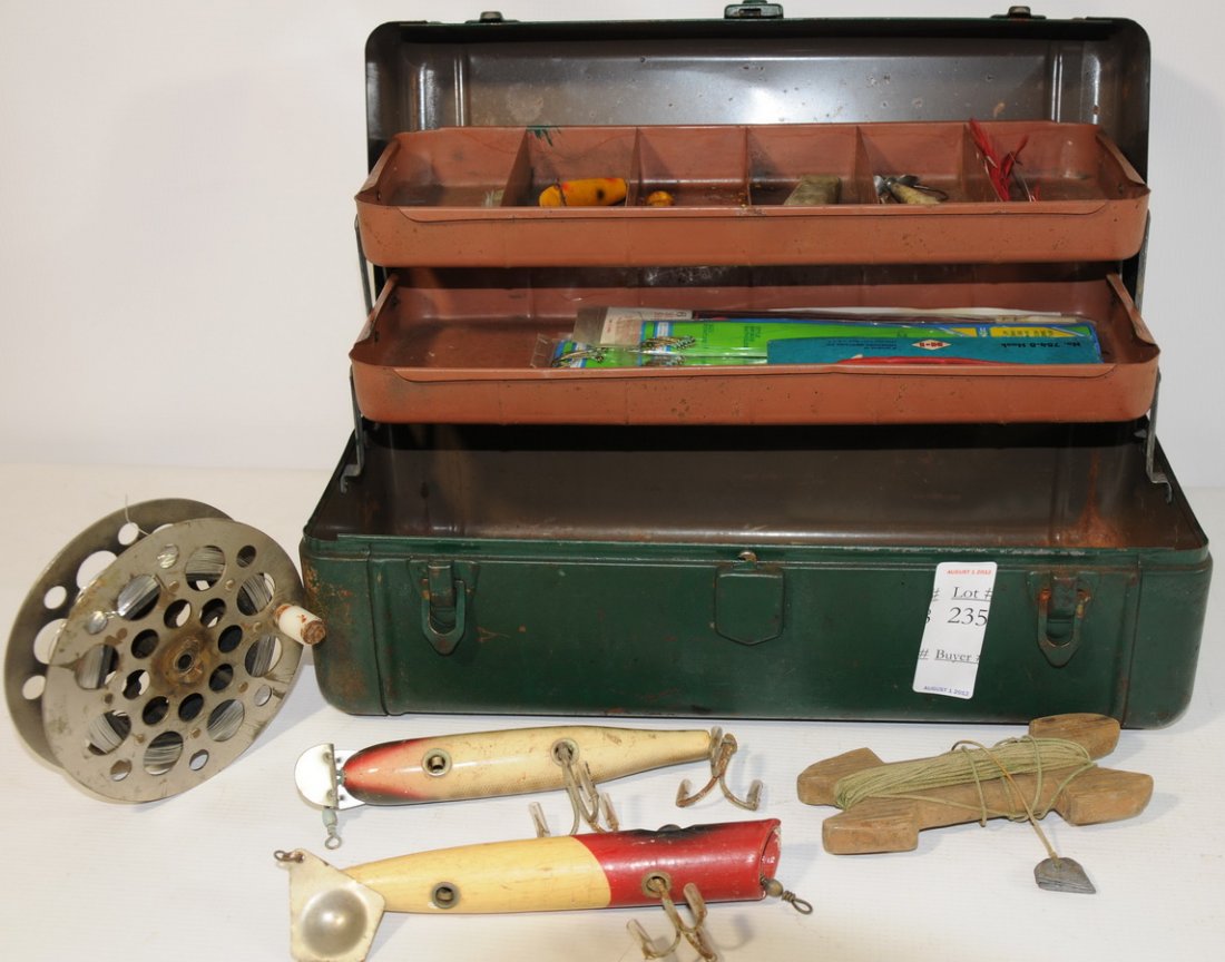 Metal tackle box filled with lures: Metal tackle box filled with lures