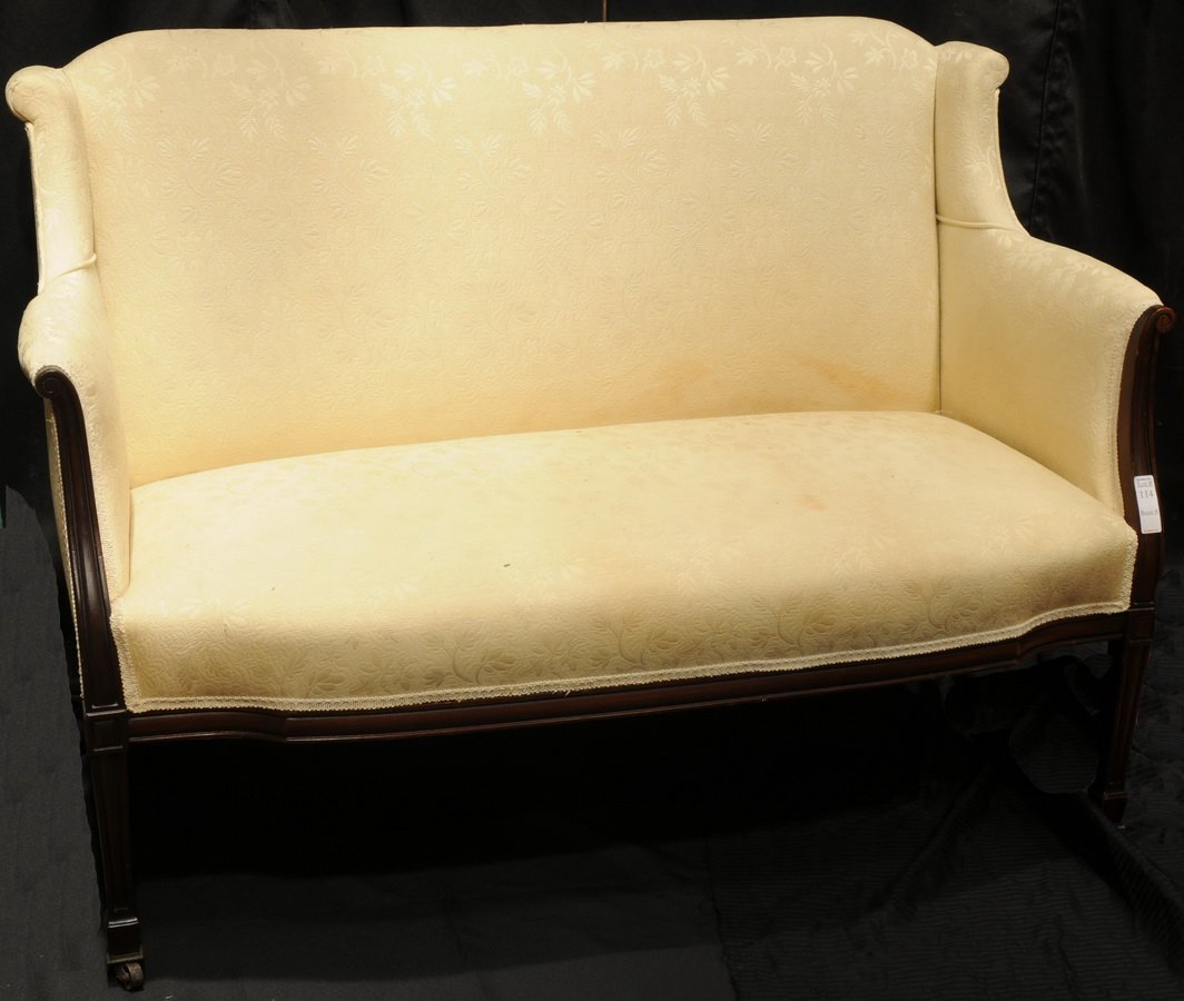 Cream colored mahogany settee 48x26 on castors: Cream colored mahogany settee 48x26 on castors