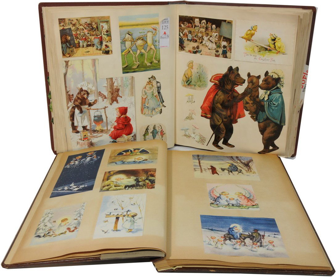 A Fantastic Pair of Victorian Scrapbooks containi: A Fantastic Pair of Victorian Scrapbooks containing trade cards, die cut lithos, postcards and ephemera including animals, valentine's, embossed die cuts, Indians, Advertising, Maxfield Parrish, Bunny
