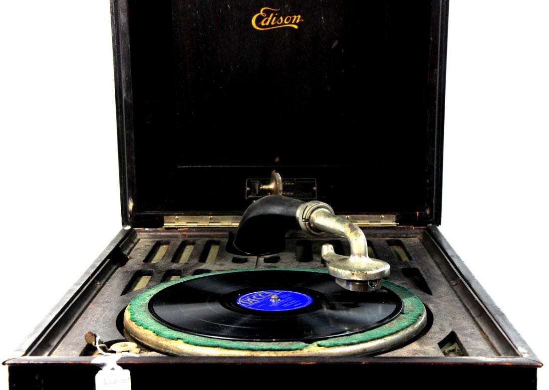 The tabletop Victrola patented 1898 Edison Phonogr: The tabletop Victrola patented 1898 Edison Phonograph. Has a 12 inch turntable and measures 16 1/2 x 17 x 21 1/2 Model No. AB80 with one record "Blue Champagne" Jimmy Dorsey