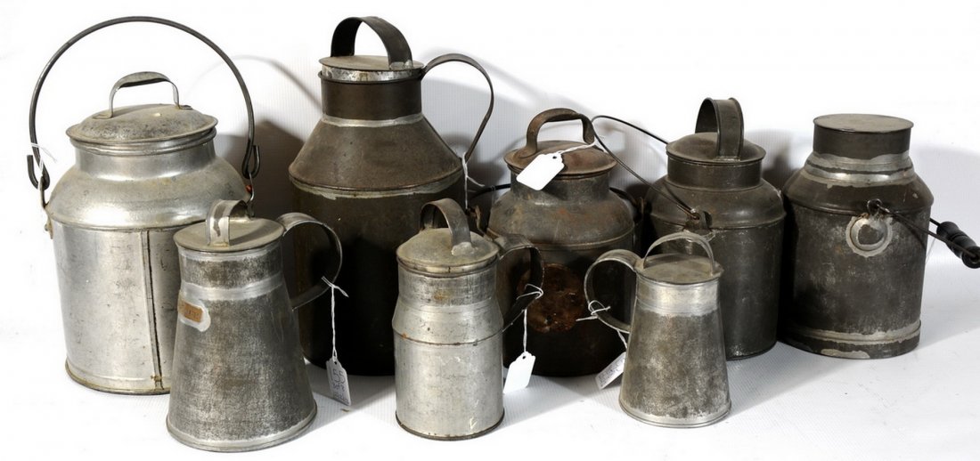 Vintage dairy creamer collection: Vintage dairy creamer collection to include: old tin creamer with bail handle and lid, stands 11" with the lid and 7" across the bottom, reads LIQ, 4 Qt., 3 creamers with similar and four tin creamers