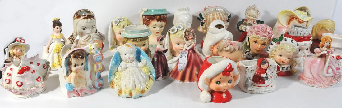 20 Head Vase Collection: Over 20 Head Vase Collection Christmas themes and general vases.