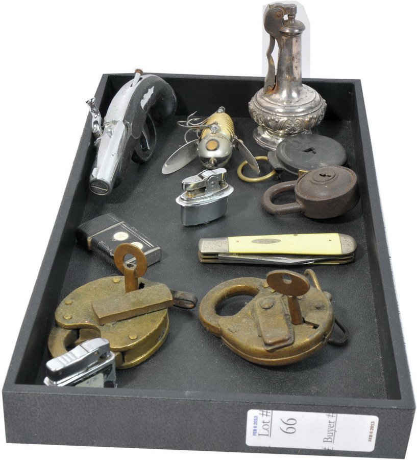 Estate Lot with lighters: Estate lot to include lighters, locks and keys, Heddon Lure, Maine Central Railroad lock, Case XX Knife and more
